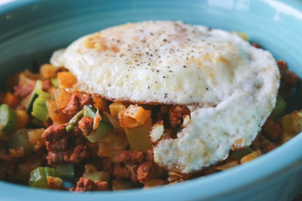 sweet potato and chorizo hash with egg on top